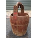 An early 20th Century Chinese red stained wooden slatted pail with shaped handle,