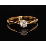 An 18ct hallmarked diamond solitaire ring, claw set brilliant cut stone, weight approximately 0.