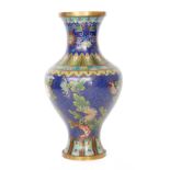 An early 20th Century Japanese cloisonne baluster shaped vase decorated with finches and flowers on