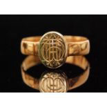 A Victorian 22ct hallmarked oval signet ring with engraved initials to oval head, Birmingham 1889,