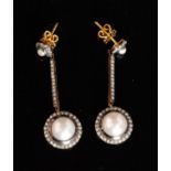 A pair of Edwardian style silver gilt diamond and split pearl drop earrings,