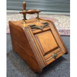 A Victorian walnut coal scuttle and shovel,