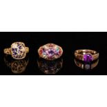 A 9ct multi coloured gem set dress ring with domed head,