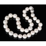 A modern graduated row of cultured pearls, diameter of largest pearl 14mm, length 44cm.