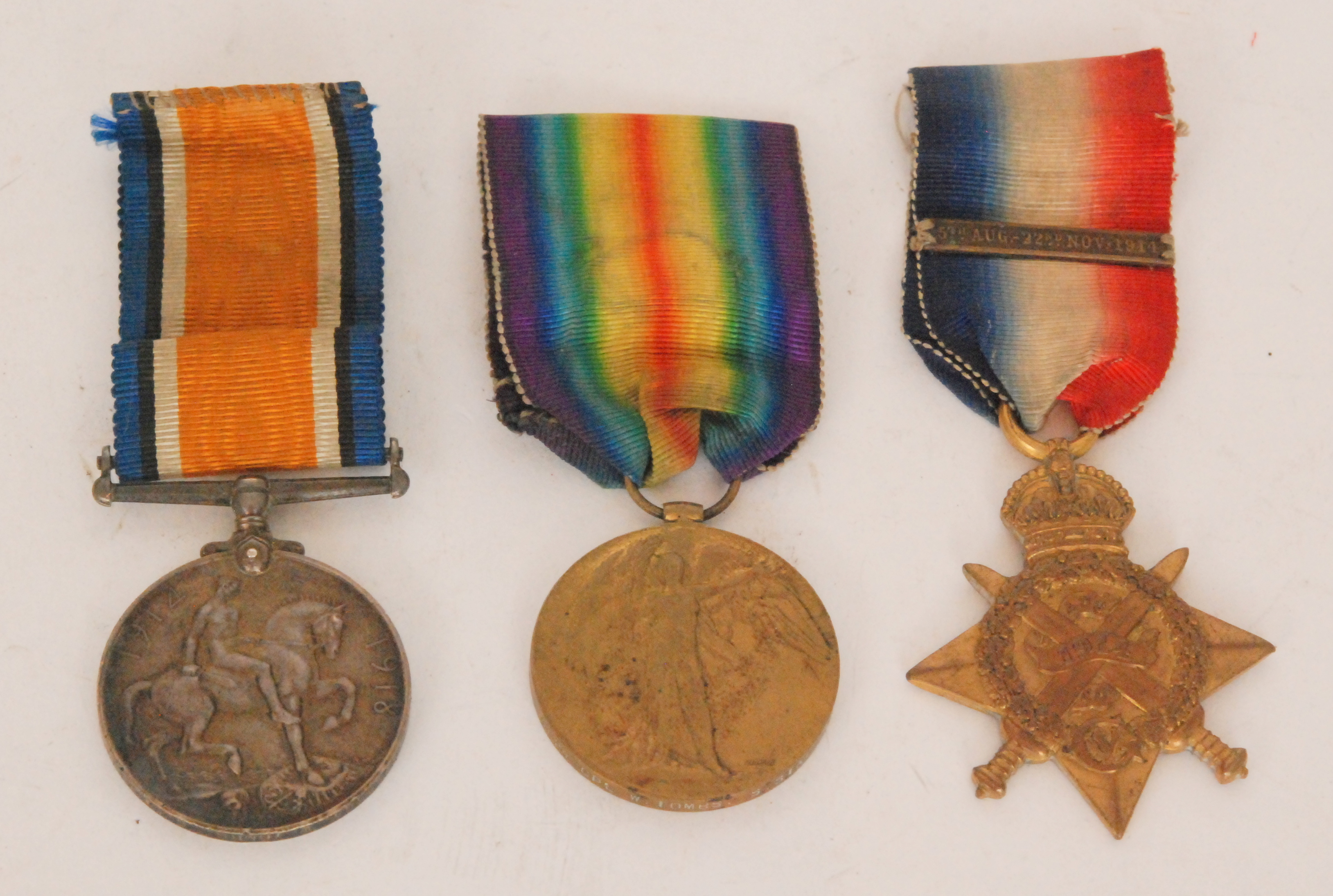 A First World War medal trio to include 1914 Star to 8824 Pte W. Tombs South Staffordshire Regiment.