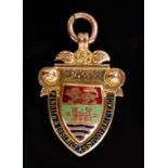 A 9ct hallmarked Penrith and District Association Football League fob dated 1911-12, weight 6.5g.