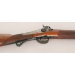 A 19th Century percussion musket with Damascus barrel and ram rod,