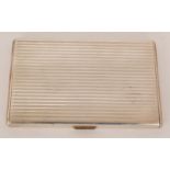 A 1950s Spanish silver rectangular cigarette case with engine turned decoration,