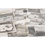 A small collection of 1930s and later photographs depicting liveried vans and interiors to include