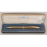 A 14K gold cased Irish Cross ball point pen marked .585, in a presentation case.