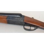 A Spanish side by side 12 bore double barrel shotgun. Shotgun certificate required upon purchase.