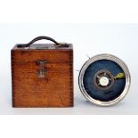 A second quarter 20th Century chrome cased pigeon racing clock in fitted oak case, width 21cm.