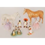 A small collection of Beswick figures to include a Thoroughbred,