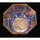 A Wedgwood Ordinary Lustre small octagonal bowl decorated with a design by Daisy Makeig-Jones,