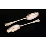 A pair of George II hallmarked silver shell back spoons,