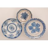 Three late 19th to early 20th Century continental tin glazed chargers each decorated in blue and