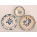 Three late 19th to early 20th Century continental tin glazed chargers each decorated in blue and