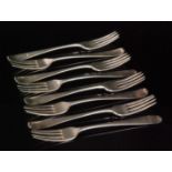 A set of eight hallmarked silver Old English pattern dessert fork with engraved bird crest to