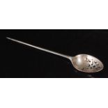 A Victorian hallmarked silver mote spoon with pierced bowl and foliate detail to husk raising to