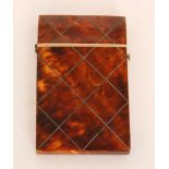 A small 19th Century tortoiseshell card case of inlaid silver cross hatch design, 9cm x 5.