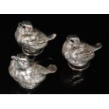 A pair of French silver models of chicks each with stone set eyes and open beaks,