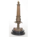 A late 19th Century brass lamp base,