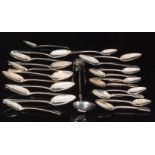 A quantity of George III and later hallmarked silver spoons to include eleven serving spoons and