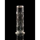 An early 20th Century Stevens & Williams clear crystal glass vase of footed cylindrical form with a