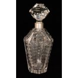 A 1930s Czechoslovakian clear cut crystal decanter of shouldered form with a white metal collar,