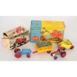 A British made pull-apart toy tractor together with other diecast tractors,