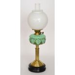 An late 19th Century brass and glass oil lamp,