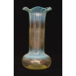 A late 19th to early 20th Century glass vase in the manner of James Powell & Sons with compressed