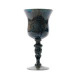 A late 19th Century Thomas Webb & Sons blue agate ware goblet with a tulip form bowl above a