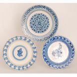 Three late 19th to early 20th Century continental tin glazed chargers each decorated in blue and