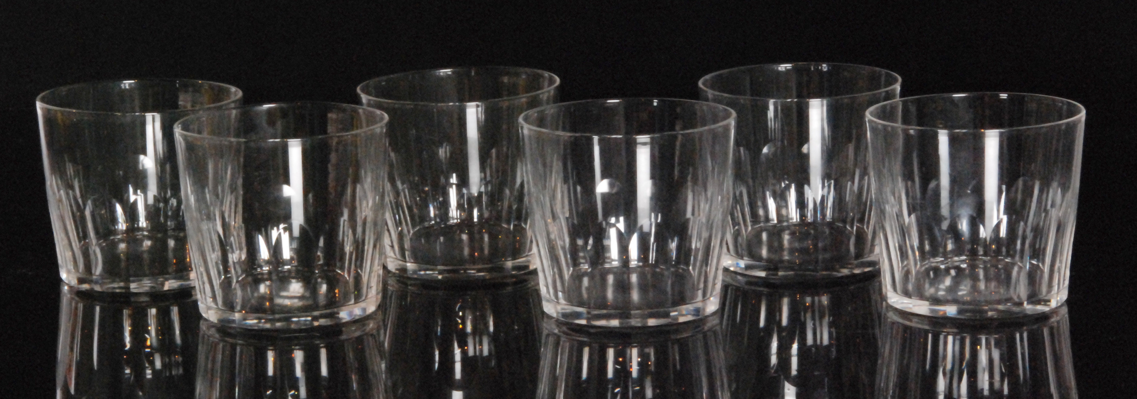 A set of 6 late Georgian clear crystal glass finger bowls of circular form with a basal slice cut
