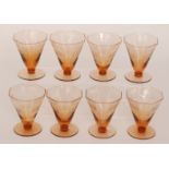 A set of eight 1930s Art Deco pale amber drinking glasses of tapered octagonal form with a fine