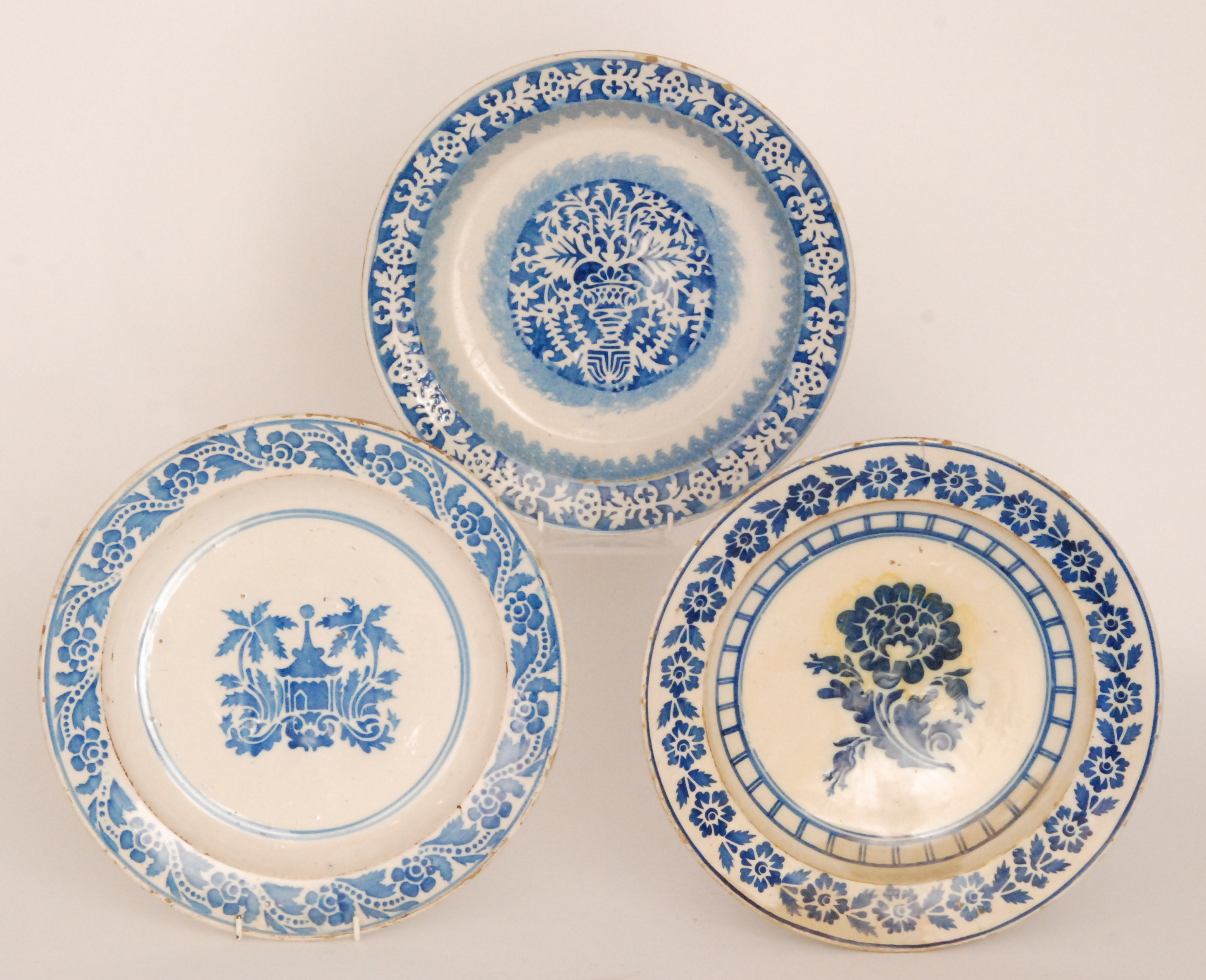 Three late 19th to early 20th Century continental tin glazed chargers,