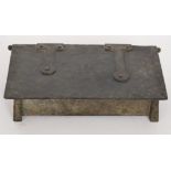 An early 20th Century Arts and Crafts style copper casket with all over planishing and two straps