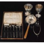 A cased set of six hallmarked silver cocktail stick each with a cockerel to terminal,