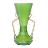 Loetz - A large early 20th Century vase of low shouldered form rising to a tall flared conical neck,