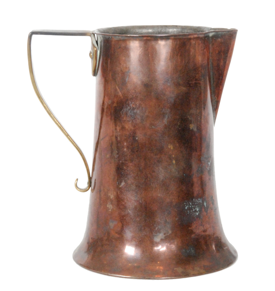 Birmingham Guild of Handicraft - An early 20th Century Arts and Crafts copper jug with spread foot