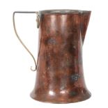 Birmingham Guild of Handicraft - An early 20th Century Arts and Crafts copper jug with spread foot