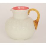 Thomas Webb & Sons - A late 19th Century water jug of compressed ovoid form with collar neck,