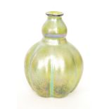 Loetz - A late 19th Century vase of lobed double gourd form with flared collar neck,