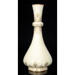 In the manner of Christopher Dresser - Sevres - A late 19th Century bottle vase with a ring knop to