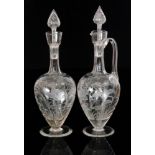 James Powell & Sons - A late 19th Century clear crystal claret jug of footed form with a wrythen