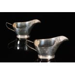 A pair of hallmarked silver sauce boats,