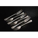 A set of six George III hallmarked silver Old English pattern diner fork of plain form, London 1813,