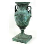 A large attractive two handled bronze Urn, with vine decorated body on a square base,