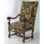 A large 19th Century carved walnut Armchair, in the early 17th Century style, with high back,